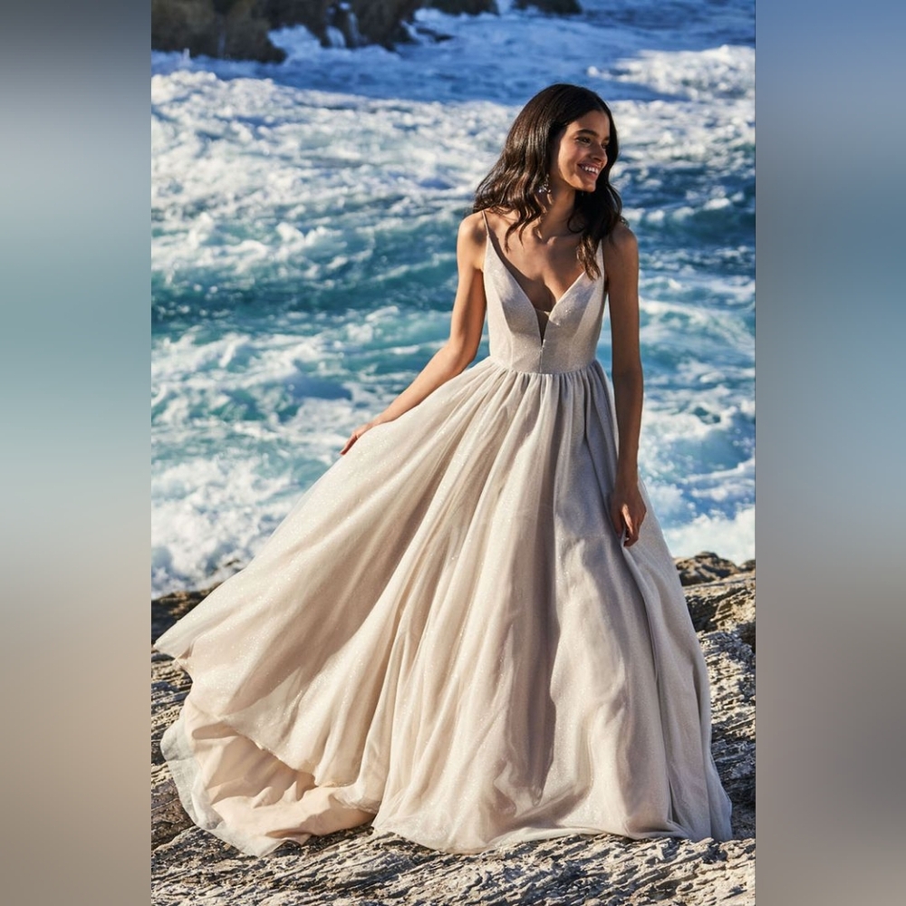 White Sleeveless V-Neck Wedding Gown
